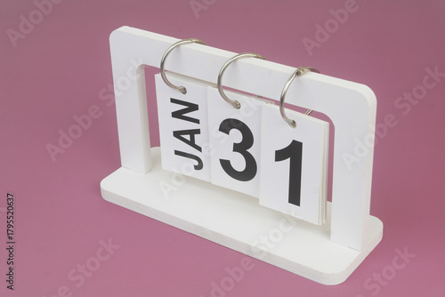 January, 31 on calendar on purple background.