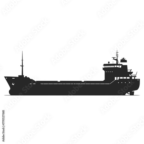 Silhouette of a cargo ship sailing on the sea