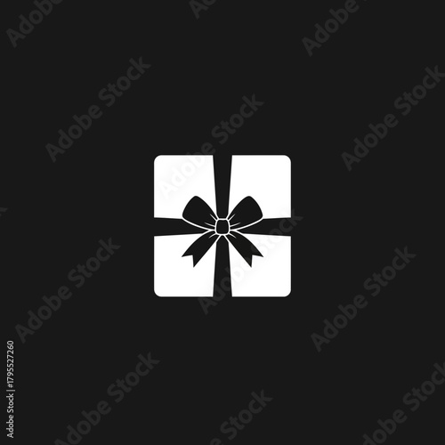 White gift box with ribbon and bow on