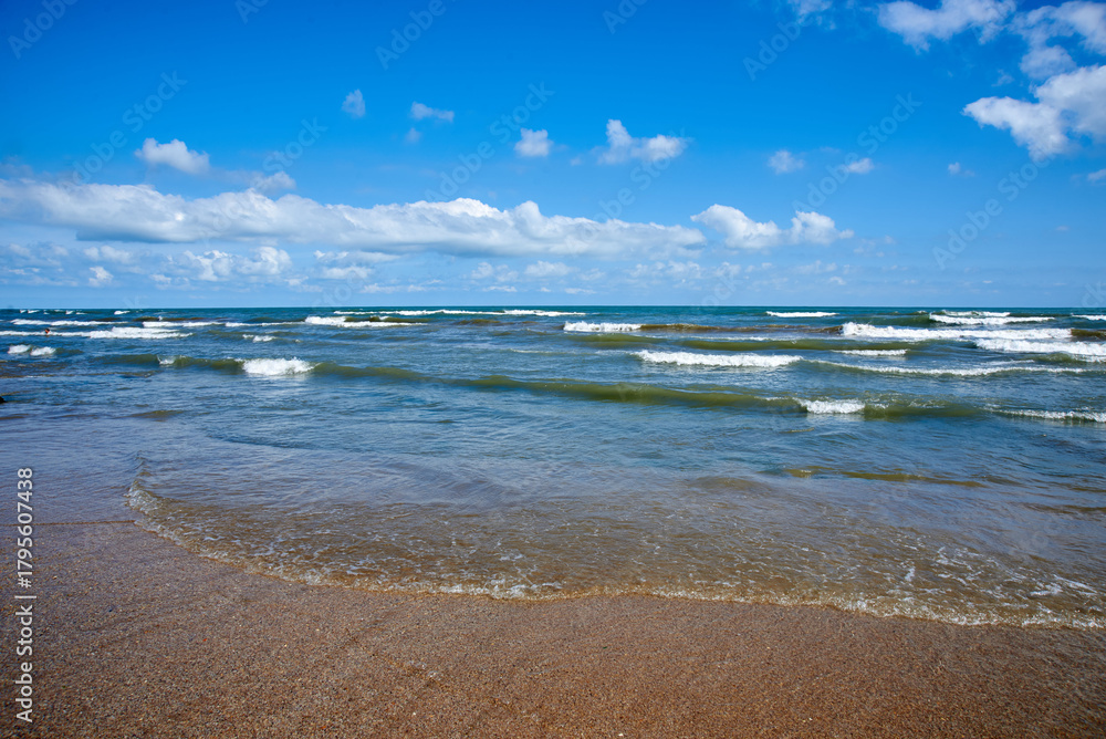 Fototapeta premium The coast of the Caspian Sea. The beach of the city of Derbent. Republic of Dagestan, Russia