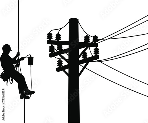 Silhouette utility worker suspended with safety harness and rope, electrical power lines, insulator