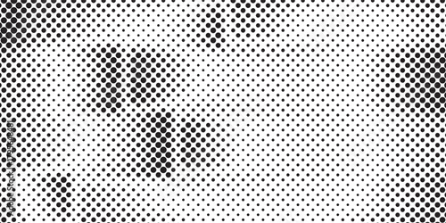 Abstract halftone dot pattern background, graphic element with black dots in various sizes for stylish digital designs, simple and versatile visual concepts.