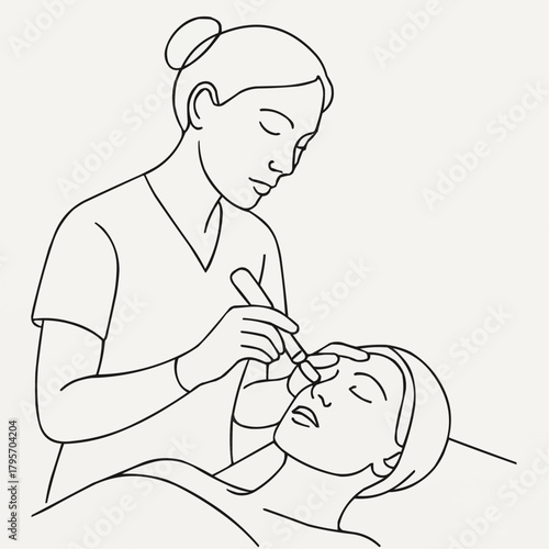 Aesthetician applying facial treatment to woman with calm expression  