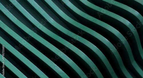 Abstract patterned surface of green steel rods arranged in curves