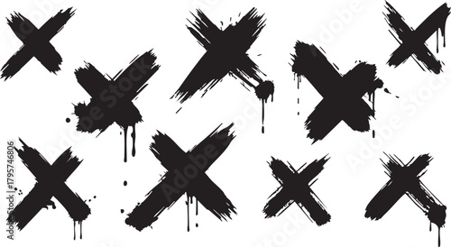 Large set of black ink brush stroke x marks with paint splatters and dripping texture effects