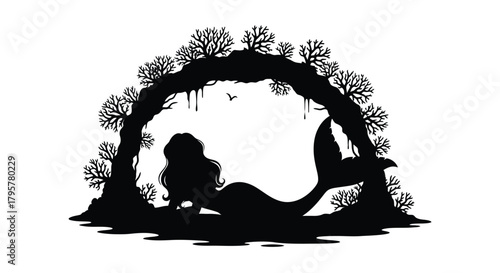 Mermaid resting within coral archway silhouette underwater