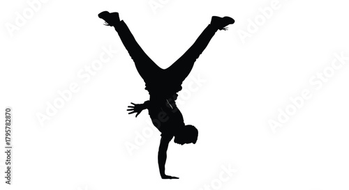 Silhouette dancer performing handstand athletic