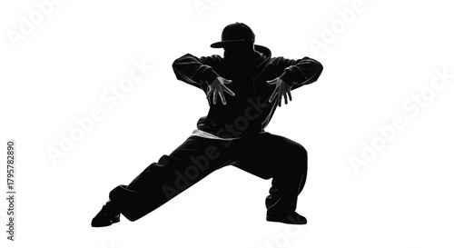Silhouette dancer performing hip hop moves urban