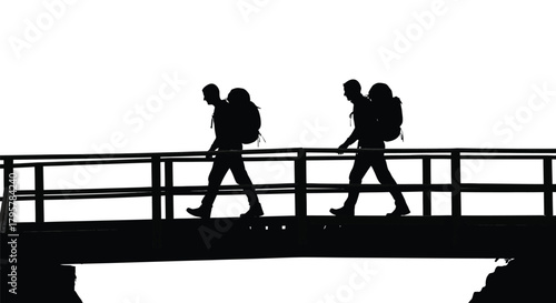 Backpackers crossing bridge walking silhouettes
