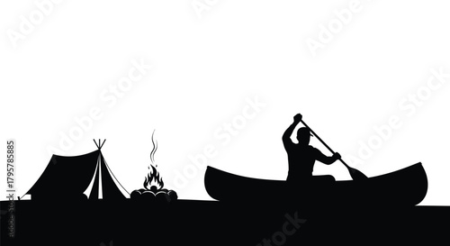 Canoeist paddles by campfire and tent paddling person