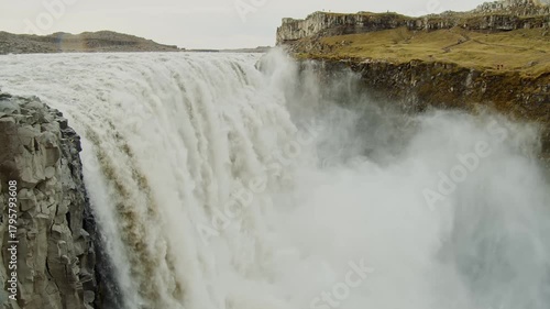 A wide shot of Dettifoss, Europe's most powerful waterfall, located in Vatnajökull National Park in Northeast Iceland.