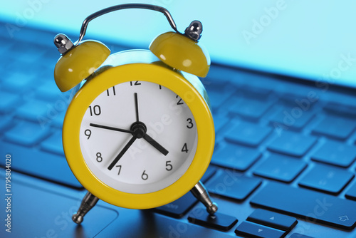 Alarm Clock On Laptop Computer Online Business Deadline Concept