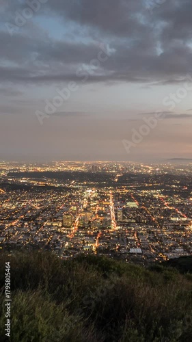Glendale and downtown Los Angeles dusk to night mountaintop time lapse.  Vertical view.