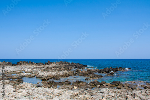 White limestone cliffs and an black sand beach near Governor s Beach, district of Larnaca, at the south coast of Cyprus