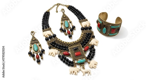 An exquisite set of antique jewelry, featuring a necklace, earrings, and bracelet, showcases intricate detailing and timeless elegance