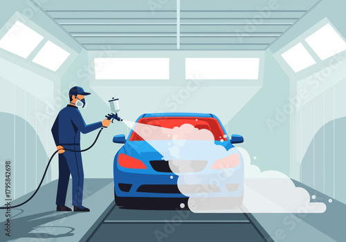 Blue Car Painting Process with Spray Gun in Auto Body Shop