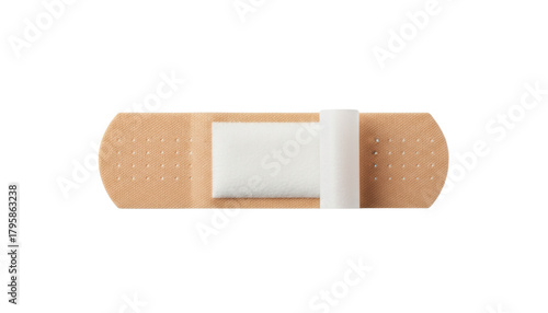 Adhesive bandage with a white absorbent pad and a brown protective backing placed flat against a white background object on white