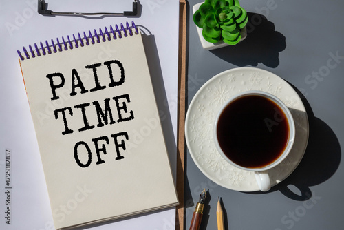 paid time off wording on a green sticker and notepad
