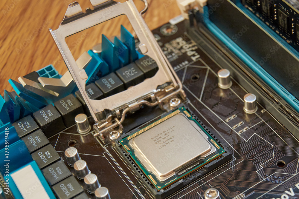 Fototapeta premium Chelyabinsk, Russia - January 23, 2021: Motherboard processor shot from above, close-up of processor