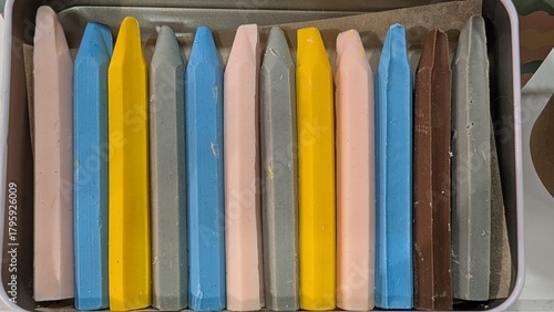 Tableau sur toile Pastel taper candles on tray stylist tabletop display