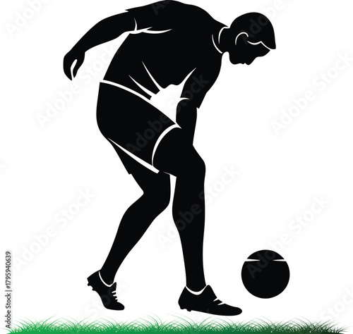 Soccer player dribbling the ball in black silhouette