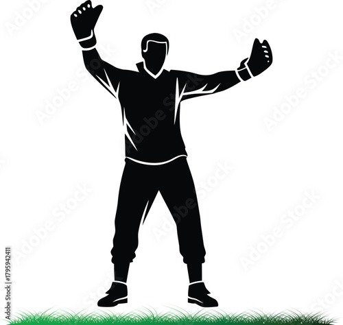 Black silhouette of goalie with hands up celebrating on grass