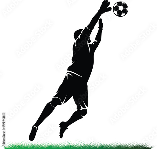 Goalkeeper silhouette reaching for a soccer ball in the air