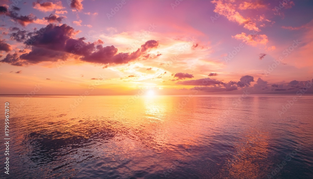 Fototapeta premium Pink Sunset At Sea Water Reflection Sun Light On Gold Yellow Clouds Sky Nature Background
