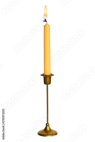 Tall slim brass candle holder and a lit taper candle, isolated on a transparent background