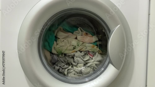 Lively factory environment featuring numerous washing machines