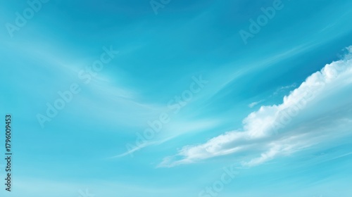 Serene Blue Sky with Soft White Clouds Against a Clear Background Perfect for Nature and Tranquility Themes in Photography and Art Projects