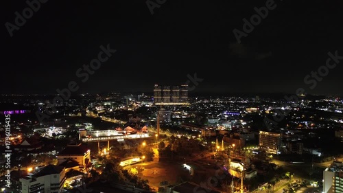 Spectacular Nighttime Urban Panorama, An Aerial Journey Through a Dazzling City of Lights at Dusk