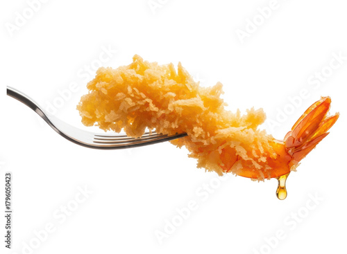 Crispy golden tempura shrimp held by a fork, with a delicious drop of sauce