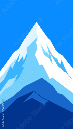 Mountain peak with snow against a blue sky backdrop