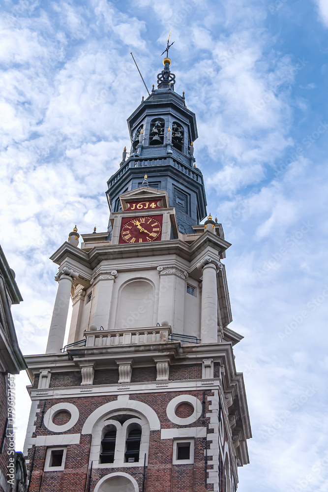 Fototapeta premium XVII century Protestant Southern church (Zuiderkerk) - in Amsterdam Nieuwmarkt area. Southern Church built in 1611 and church tower in 1614, dominates the surrounding area. Amsterdam. The Netherlands.