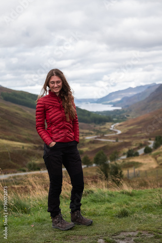 Smiling Blonde Woman in Hiking Outfit at Glen Docherty Viewpoint in the Scottish Highlands