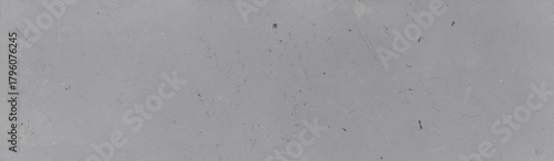 Gray plastic texture with dents and scratches on a worn surface