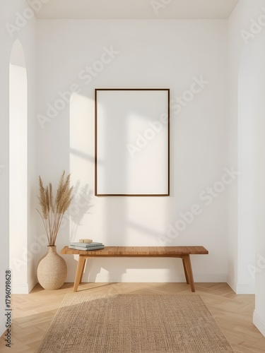Hallway interior with a wooden bench, a frame mockup, a vase with dry plants, and a rug on the floor in a minimalist style with sunlight