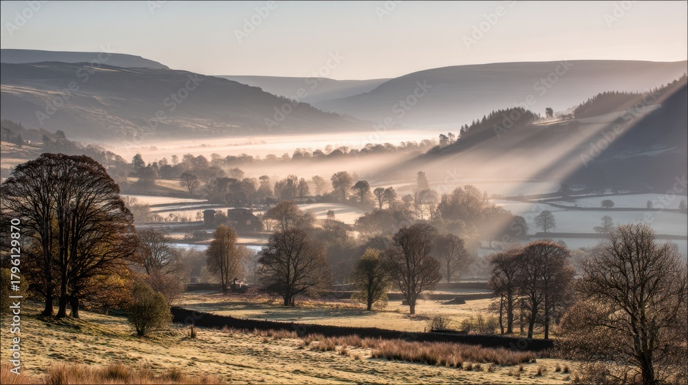 Fototapeta premium Serene Morning Landscape in the Valley with Soft Light Rays Illuminating Trees and Mist over Fields and Hills in Early Sunrise Atmosphere