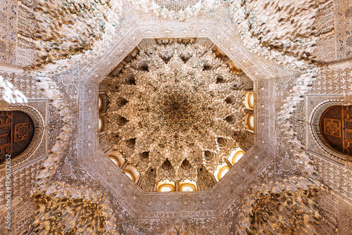 Ornate muqarnas ceiling in the Hall of the Two Sisters in Granada