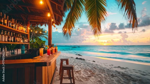 Open-air tropical beach bar with colorful cocktails on a sandy beach at sunset.