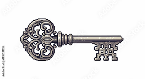 An intricately designed antique silver skeleton key with ornate detailing on the bow and shaft.