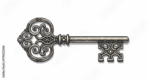An intricately designed antique skeleton key with ornate scrollwork and a metallic finish, isolated on a white background.