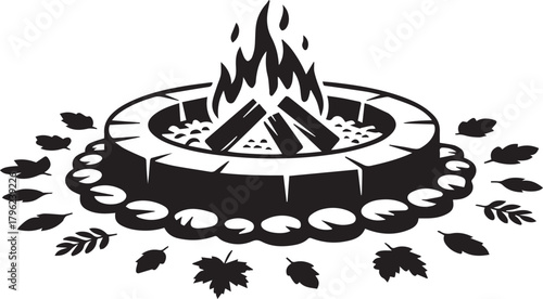 Black fire pit with firewood and decorative leaves creating campfire ambiance