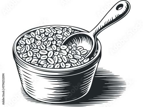 Bowl of coffee beans with spoon