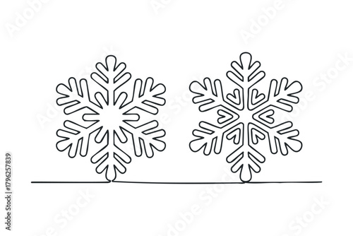 Two abstract snowflakes outlined on a white background