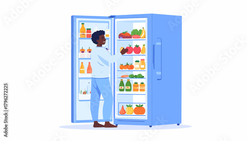 Man Looking into a Fully Stocked Refrigerator at Home