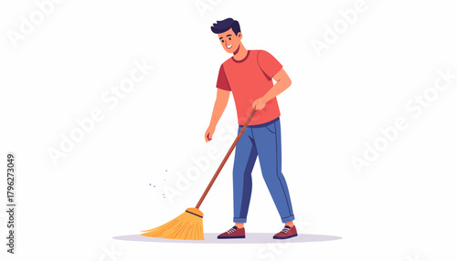A determined young man is actively sweeping dust and debris from the floor with a broom, embodying the essential task of household cleaning and maintaining a tidy living space