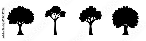 Collection of four distinct black silhouetted trees for nature design elements