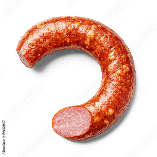 A piece of cured meat with a textured surface, likely a type of sausage or salami, presented against a white background.